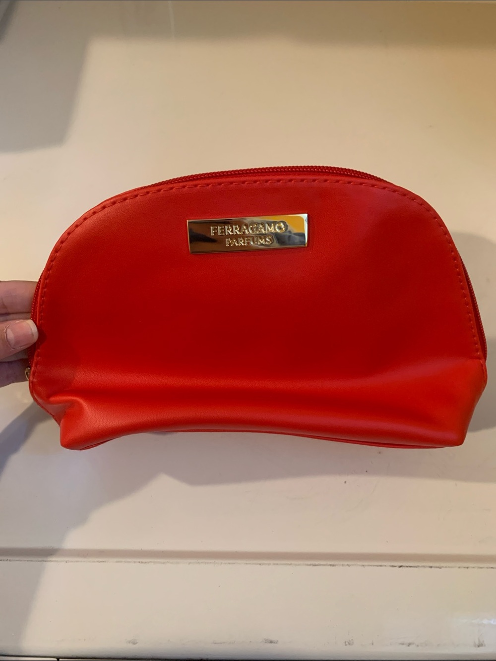 NWOT Salvatore Ferragamo Parfums Red Cosmetic Case with Gold Logo Plaque